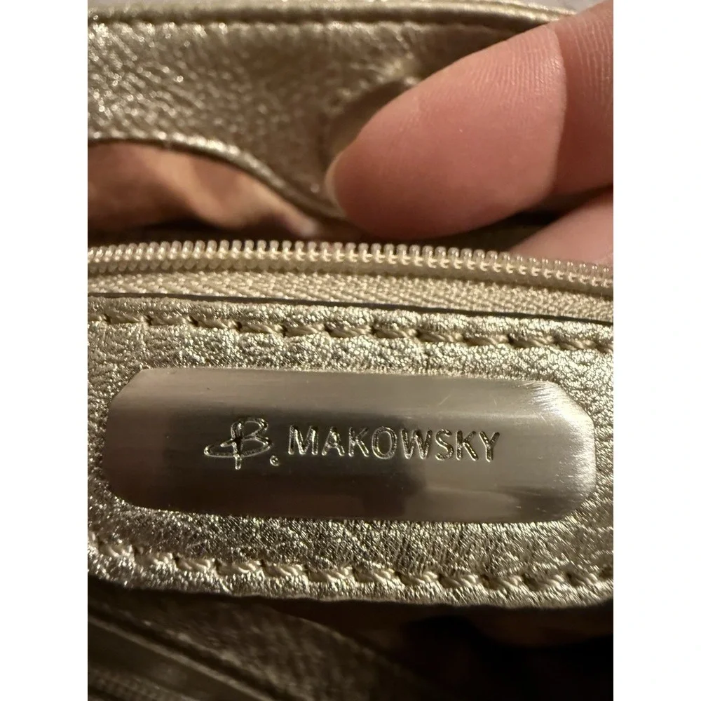 B. Makowsky Metallic Gold Leather Crossbody Purse Magnetic Close Tassels Zippers